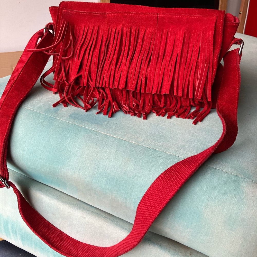 Red  fringe suede purse.